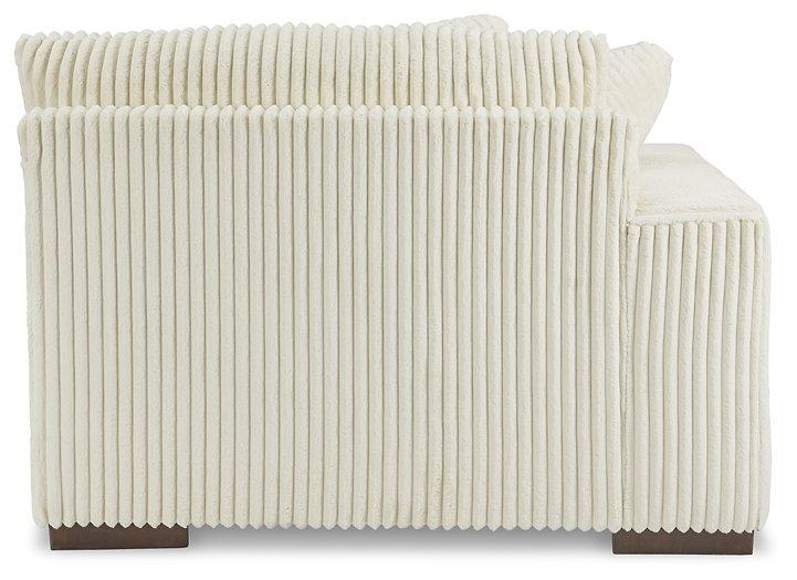 Lindyn Sectional with Double Chaise - Bill's Discount Center (Bradenton, FL)