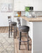 Caitbrook Bar Height Bar Stool - Bill's Discount Center (Bradenton, FL)