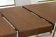 Lyncott Dining Extension Table - Bill's Discount Center (Bradenton, FL)