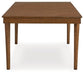 Lyncott Dining Extension Table - Bill's Discount Center (Bradenton, FL)