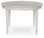 Montelaine Dining Extension Table - Bill's Discount Center (Bradenton, FL)