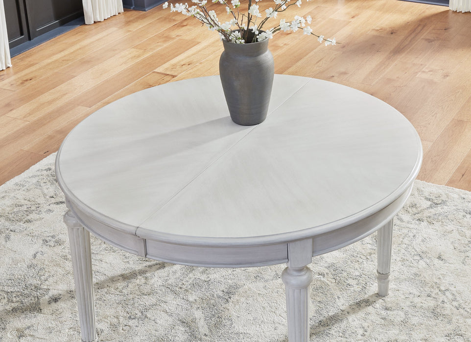 Montelaine Dining Extension Table - Bill's Discount Center (Bradenton, FL)