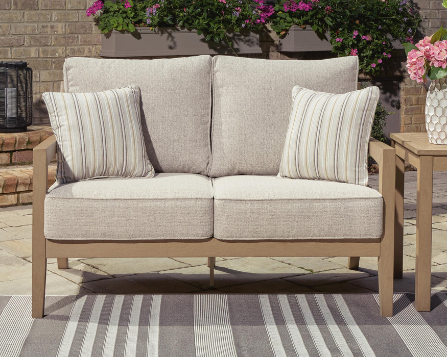 Hallow Creek Outdoor Loveseat with Cushion - Bill's Discount Center (Bradenton, FL)