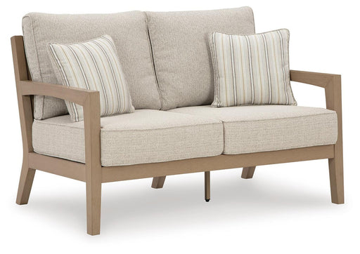 Hallow Creek Outdoor Loveseat with Cushion - Bill's Discount Center (Bradenton, FL)
