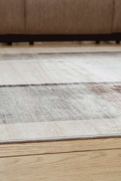 Larkport Washable Area Rug - Bill's Discount Center (Bradenton, FL)