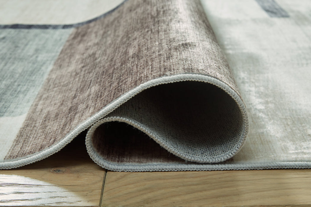 Larkport Washable Area Rug - Bill's Discount Center (Bradenton, FL)